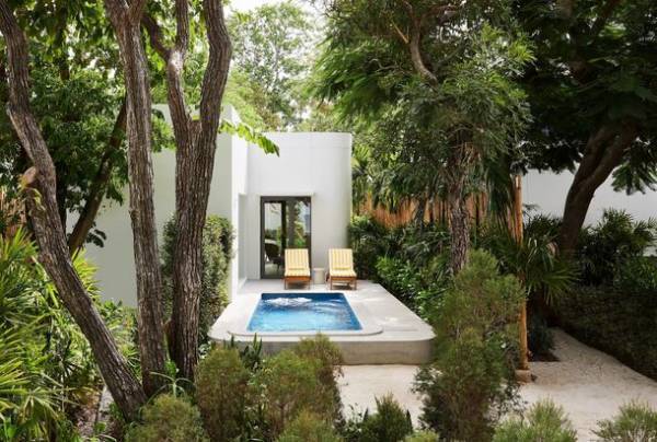 米国の権威ある旅行誌「コンデナスト・トラベラー」が2022年のホットリストにタイで唯一選出したホテル　ザ・スタンダード・ホアヒン　宿泊人数に応じて複数のヴィラと中庭を組み合わせてグループごとに独立したプライベート・ゾーンを作れる宿泊スタイル「ヴィレッジ・ヴィラズ」を提案・販売