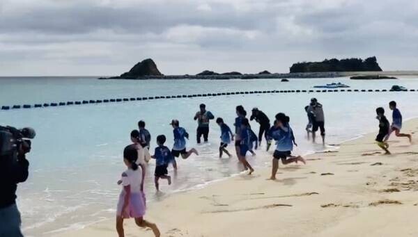 沖縄県金武町「KINサンライズビーチ海浜公園」で海開きが開催されたことを報告