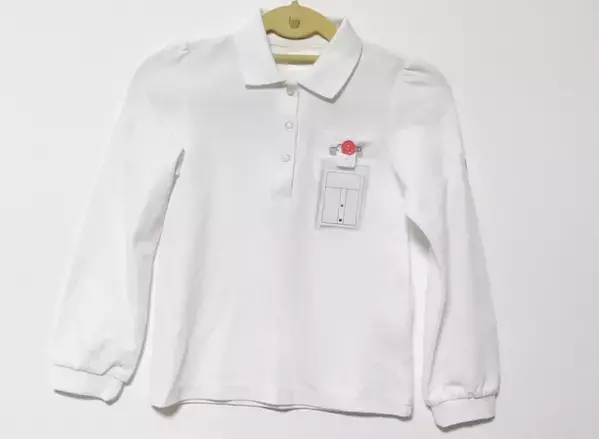 発達障害などがある手先の不器用な児童向け、名札の掛け外しをしやすい留め具「名札も楽勝！」を発売