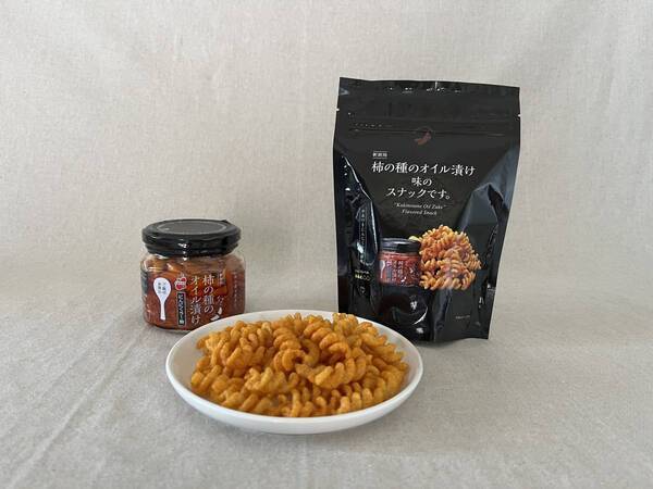 にんにくラー油のくせになる味わいをお手軽に！「柿の種のオイル漬け味のスナックです。」7月18日新潟県内限定新発売