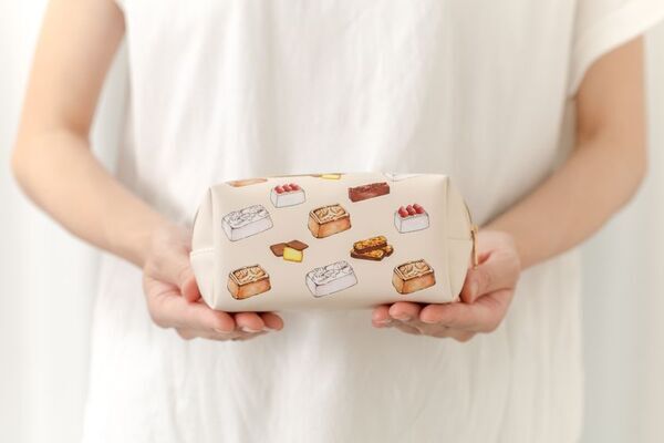 焼菓子を詰め合わせたスイーツポーチ付き季節限定商品『トップス HITOTSUGI スイーツポーチ』を7月12日に発売