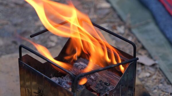 コニファーコーン10周年、フラグシップモデルを刷新　折りたたみ式二次燃焼ストーブ「パイロキューブ」と専用ギアケース「ギアドック2」を5月15日に発売