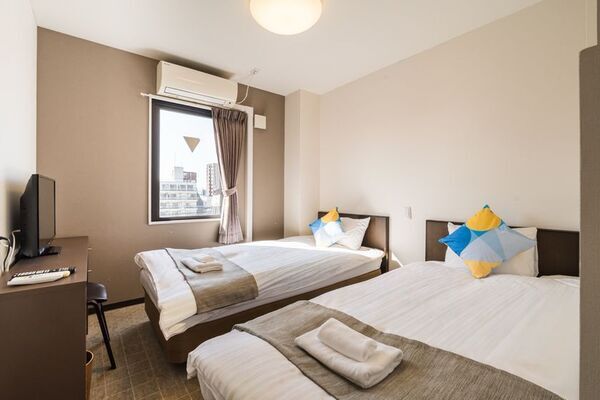 大阪・西成「あいりんエリア」にどやねんホテルズ11棟目となる「OKINI - DOYANEN HOTELS」をグランドオープン