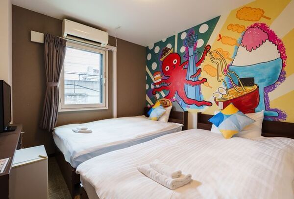 大阪・西成「あいりんエリア」にどやねんホテルズ11棟目となる「OKINI - DOYANEN HOTELS」をグランドオープン