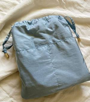 《水色》が「乙女心をくすぐる」可愛さ♡♡【しまむら】「優秀」すぎる”巾着ポーチ”